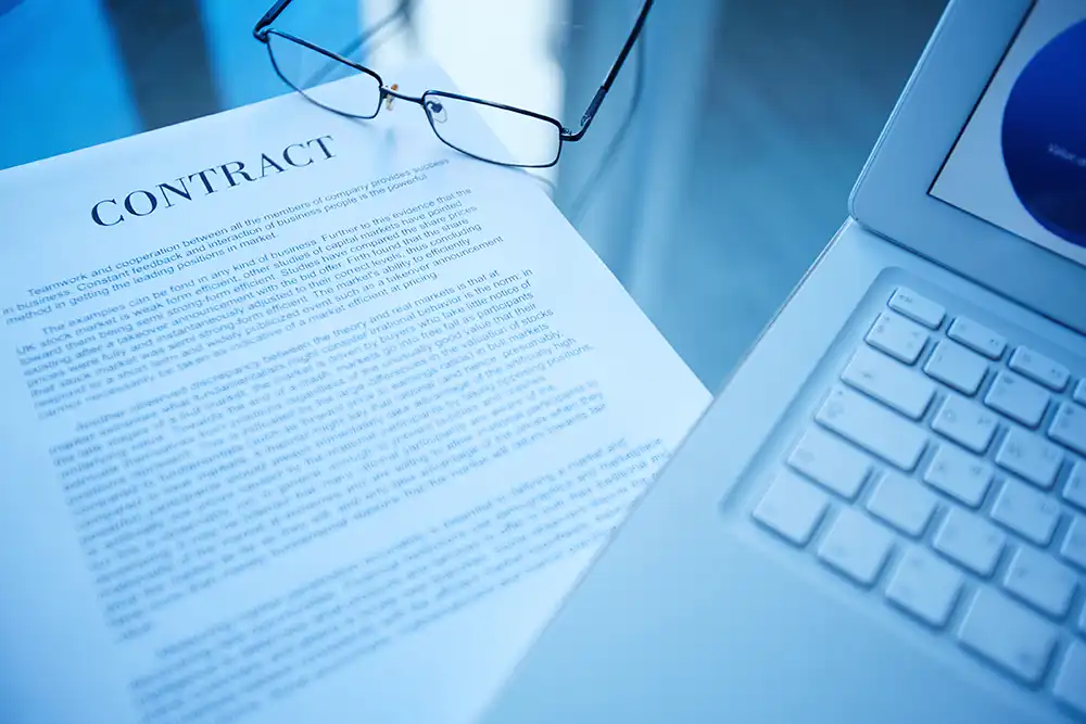 close up business document laptop desk.webp