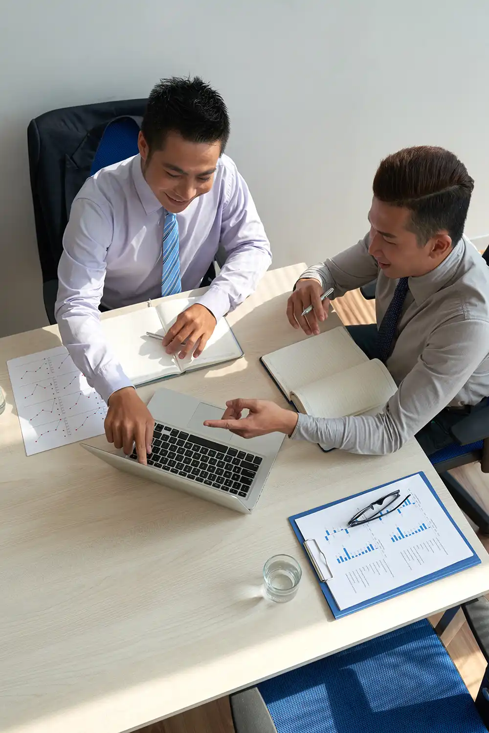discussing data laptop screen.webp